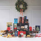 The Irish Christmas Food Hamper featuring Christmas pudding, mince pies, rich fruit cake, Tayto crisps, Bewley’s coffee, Barry’s Tea, Butlers chocolates, gourmet biscuits, preserves, and festive treats beautifully arranged with holiday decorations – available at GiftsDirect.com The Irish Christmas Food Hamper featuring Christmas pudding, mince pies, rich fruit cake, Tayto crisps, Bewley’s coffee, Barry’s Tea, Butlers chocolates, gourmet biscuits, preserves, and festive treats beautifully arranged with holiday decorations – available at GiftsDirect.com